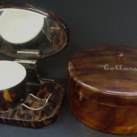 2 x items - 1940's faux tortoiseshell shaving set with oval bevelled mirror & Xylonite faux tortoiseshell collar box - Sold for $55 - 2014