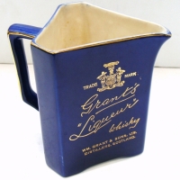Grant's Liqueur Whisky water advertising jug -  Cobalt blue triangular shape - Gold print - Sold for $61 - 2014