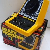 Boxed hand held Crazy Monster Tabletop computer game by Grandstand - Sold for $122 2014