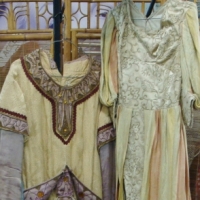 Group lot medieval costumes inc - brown velvet coat with hood, cream and purple dress with embroidery, large green velvet coat with faux fur trim, etc - Sold for $98 2014