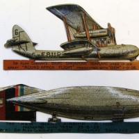 2 x circa 1928 Gem Comic - tinplate  promotional gifts-  'The New Giant Airship R100' & 'Sir Alan Cobham's Short Singapore Seaplane' - Sold for $98 2014