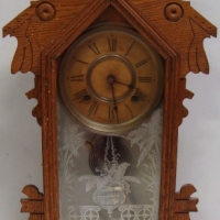 Circa 1900 American Ansonia Clock Co oak mantle clock with pendulum, ornately carved - Sold for $92 2014