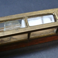 Fine cabinet makers spirit level in mahogany by Edward Preston and Sons with registered design number, fretted brass bubble escapement with large wind - Sold for $134 2014