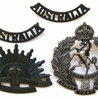 Group lot Australian WWI military badges inc - Rising Sun, 8th Light Horse, etc - Sold for $390 2014