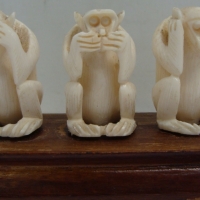 Set of vintage Elephant Ivory wise monkeys Mizaru, Mikazaru, and Mazaru finely carved on wooden stand - Sold for $55 2014