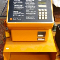 Bright orange TELSTRA PAY PHONE gold phone - in great condition on phone book shelf and with key - Sold for $159