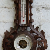 Ornately carved wall hanging barometer - Sold for $24