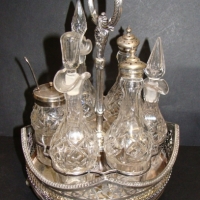 Victorian silverplated  rotating cruet with 6 crystal bottles on pierced stand - Sold for $67 2014