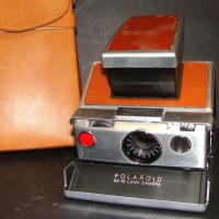 Polaroid SX-70 land camera in leather case - Sold for $61 2014