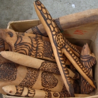 Box lot tribal poker work items inc - emu foot, coolamon, boomerangs, etc circa 1950s - Sold for $61 2014