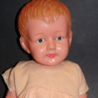 Japanese CELLULOID Doll - toddler boy - hand painted features, molded hair - 40cms L - marked Lucky Toys - gcond - Sold for $92 2014