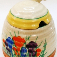 Art Deco Clarice Cliff honey or sugar pot in the Crocus pattern marked to the base Clarice Cliff Newport Pottery - Sold for $73 - 2014