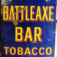 Ogden's Battleaxe Bar Tobacco enamel sign circa 1920s with some losses to enamel - 92 cm by 61cm - Sold for $561 - 2014