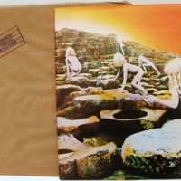 2 x vintage LED ZEPPLIN LP records - In Through the Out Door with original brown paper cover & Houses of the Holy - Sold for $79 - 2014