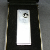 PLAYBOY cigarette lighter in boxes with papers (Ex-Collection of Bill Howard) - Sold for $30 - 2014