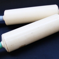 2 x  Bakelite rolling pins one with green handles  - the other with blue - Sold for $55 - 2014