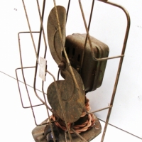 Small 1930's electrical fan with twin blades in the shape of and S - Sold for $61 - 2014