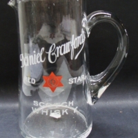 DANIEL CRAWFORD Red Star Scotch Whisky glass jug - approx 19cms tall - Sold for $98 - 2014