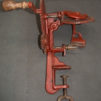 1920/30's Bench mounted cast iron apple corer and peeler with self ejecting mechanism - marked Glass - Sold for $30 - 2014