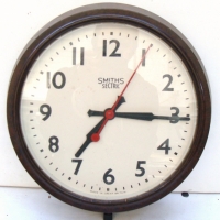 Brown Bakelite Smiths Sectric wall clock with 9 inch dial - Sold for $98 - 2014