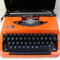 Retro orange Brother 210 portable typewriter - Sold for $43 - 2014