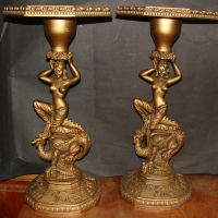 Pair of gilded resin pedestals of a Nubian princess atop a dragon - Sold for $61 - 2014