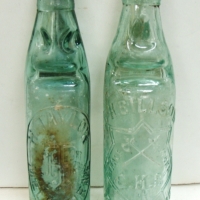 2 Codd Bottles by C H Billson with crossed axe trademark  Melbourne and H T Taylor Melbourne with Monogram with some wear to raised lettering - Sold for $37 - 2014