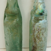 2 x Evan Rowland's late Rowland's and Evans Ballarat & Melbourne Codd bottle with Farmer and Miner trademark one iridised the other with worn letterin - Sold for $146 - 2014