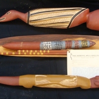 Group of Aboriginal tools - Woomera with grass tree resin wood and string binding - fire sticks with label and painted clap stick - Sold for $55 - 2014