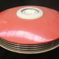 1950's UFO shape heater by Rayflow in pink and sputnik legs - Sold for $98 - 2014