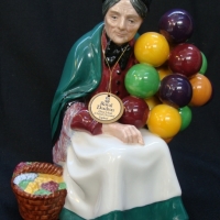 Royal Doulton Figurine - The Old Balloon Seller - HN 1315 - 191cms H - Sold for $67 - 2014