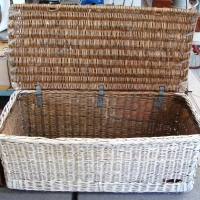 Very large Cane steamer trunk with raw leather strapping - Sold for $61 - 2014