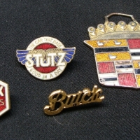 Group lot vintage enameled car badges inc - Essex Motors, Stutz, etc - Sold for $55 - 2014