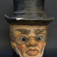 c1900 Plaster head - Victorian gent wearing top hat, glasses with moving glass eyes - Sold for $104 - 2014