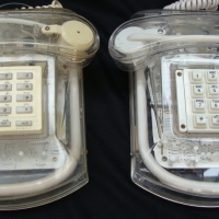 2 x 1980's  Cicena & Roxanne transparent telephones with neon Lucite in blue & hot pink - Sold for $110 - 2014