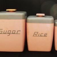 Set of pink and grey 1960s plastic canisters by Nally Ware - Sold for $73 - 2014