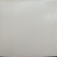 The Beatles LP Record -  THE WHITE ALBUM - containing booklet with lyrics and individual photos of the fab 4  - 1968 apple records - Sold for $37 - 2014