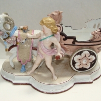 19th Century German porcelain figure of a cherub and goat towing a cart with an eagles head - Sold for $55 - 2014