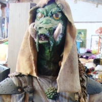 Large unusual hand made science fiction character - green reptilian alien in cloak - approx 98cm - Sold for $159 - 2014