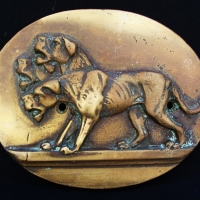 Brass plaque  featuring the three headed dog Cerberus - Sold for $43 - 2014