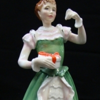 Royal Doulton Figurine - Merry Christmas - HN 3096 - 1987-1992 216 cms H - Sold for $79 - 2014