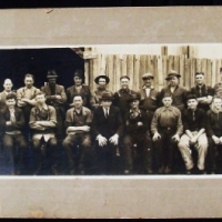 Vintage mounted panoramic photograph - Men Outside Timber yard - marked H M Walker, Collins St Melbourne - Sold for $30 - 2014