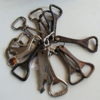 Group lot vintage bottle openers inc - 2 x  ladies leg with heels shaped openers, etc - Sold for $49 - 2014