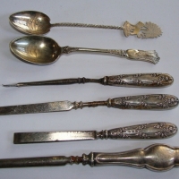 Small group lot Sterling silver items inc - part manicure set, spoons, etc - Sold for $43 - 2014