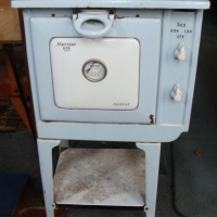 Vintage upright baby blue enameled stove by Metters - Sold for $55 - 2014
