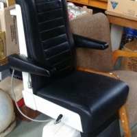 Vintage fully reclining optometrists chair - black vinyl upholstery, adjustable head rest etc - Sold for $85 - 2015