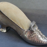 c1900 Silver plated EPBM high heel shoe pin cushion with floral buckle - Sold for $61 - 2015