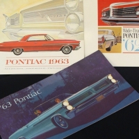 3 x Vintage Pontiac sales brochures inc 1962 Wide-Track, 1963 Pontiac & 1963 Parisienne series - fab colour images, specifications etc - Sold for $27 - 2015