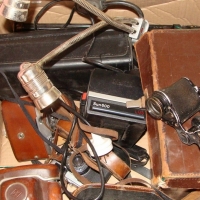 Box of Vintage camera gear incl binoculars, Polaroid Sun 600, Agfa 35mm cameras etc - Sold for $79 - 2015