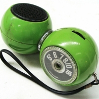 Vintage lime green plastic transistor radio by Toshiba model rp-12 with Two hemispheres joined by a chrome ring - Sold for $55 - 2015